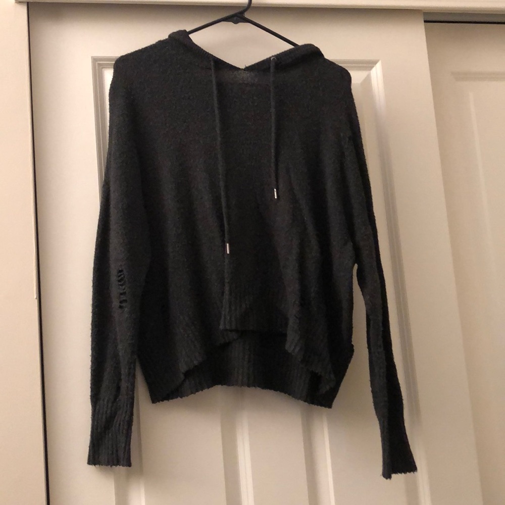 hooded ripped sweater.